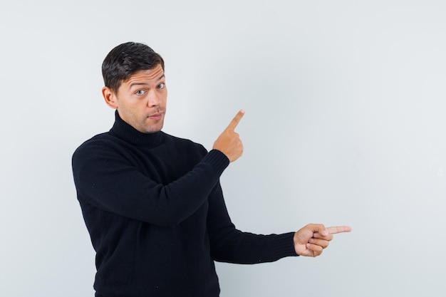 An expressive man is posing in the studio