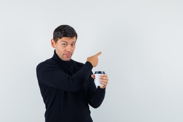 An expressive man is posing in the studio