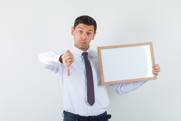 An expressive man is posing in the studio