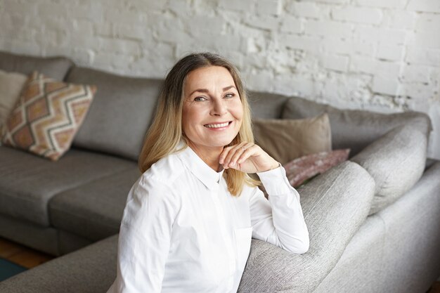 Expressive middle aged woman posing