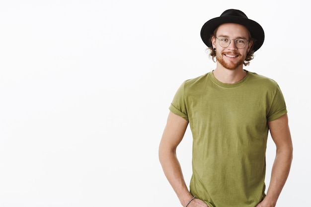 Expressive redhead bearded man with a hat