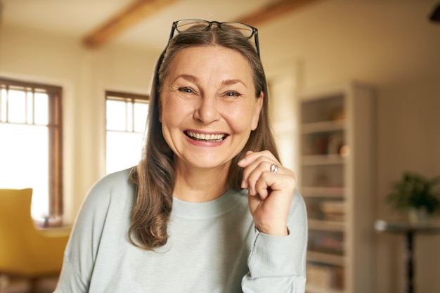 Expressive senior female posing indoor