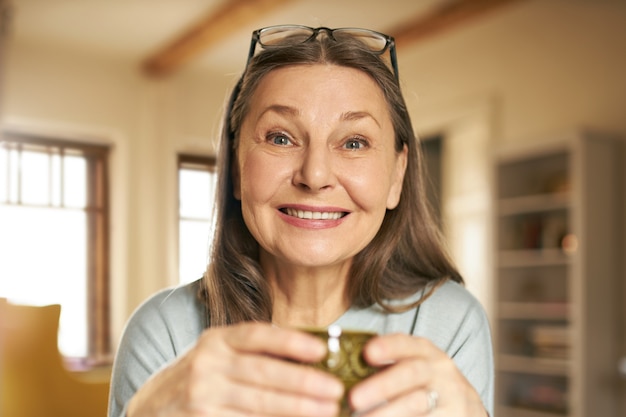 Expressive senior female posing indoor