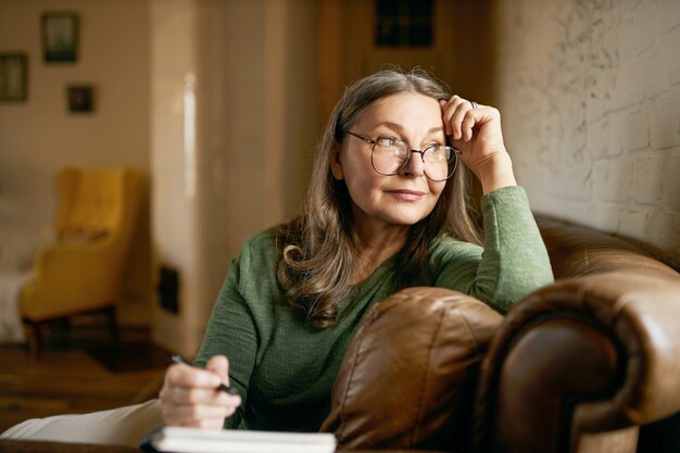 Expressive senior female posing indoor