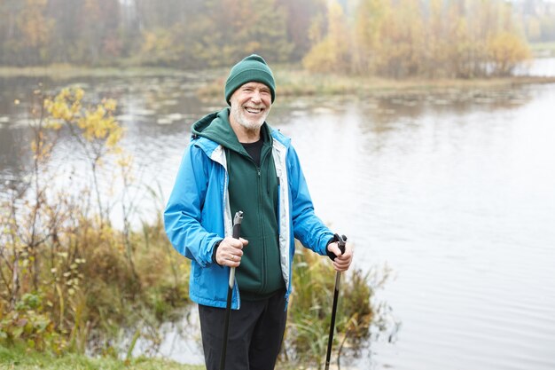 Expressive senior man posing outdoor