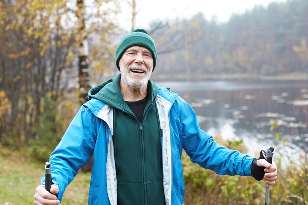 Expressive senior man posing outdoor