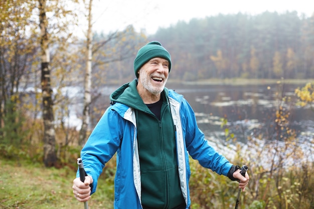 Expressive senior man posing outdoor