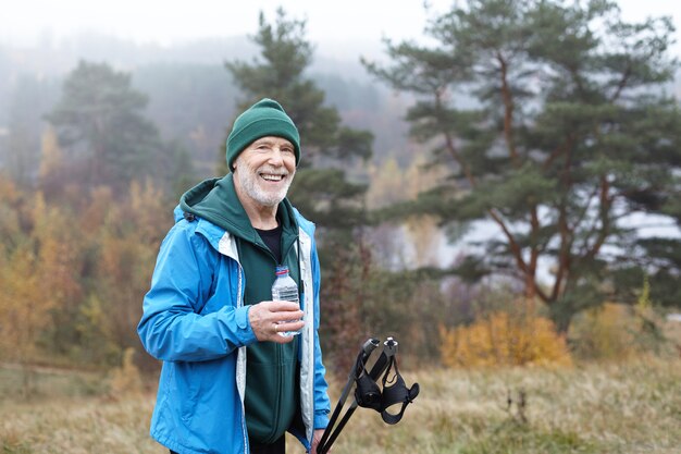 Expressive senior man posing outdoor