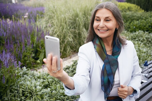 Expressive senior woman posing