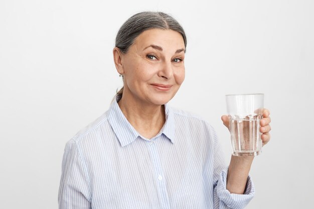 Expressive senior woman posing