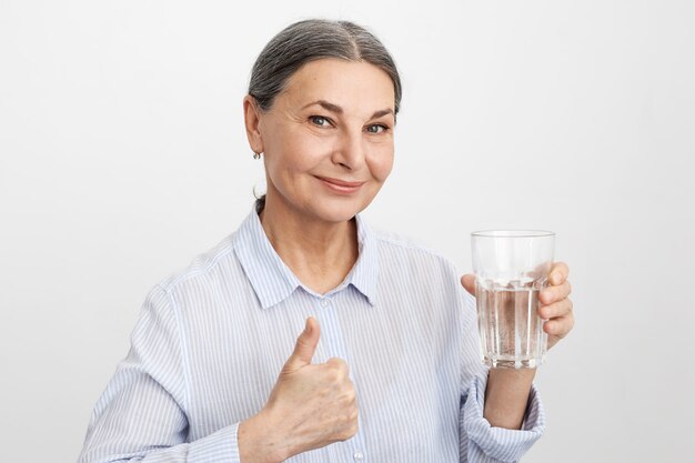 Expressive senior woman posing