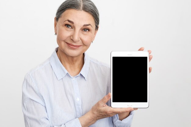 Expressive senior woman posing