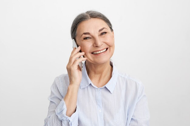 Expressive senior woman posing