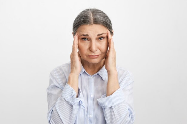 Expressive senior woman posing