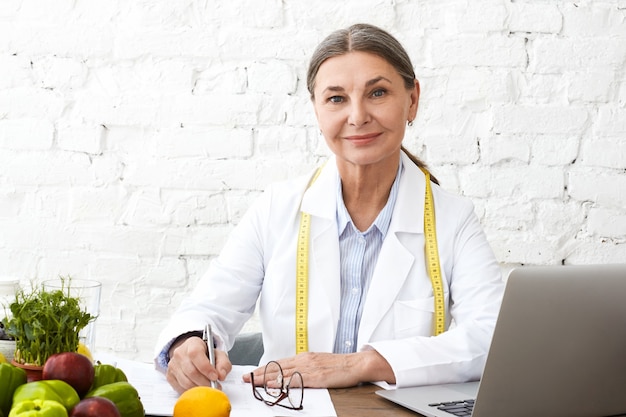 Free photo expressive senior woman posing