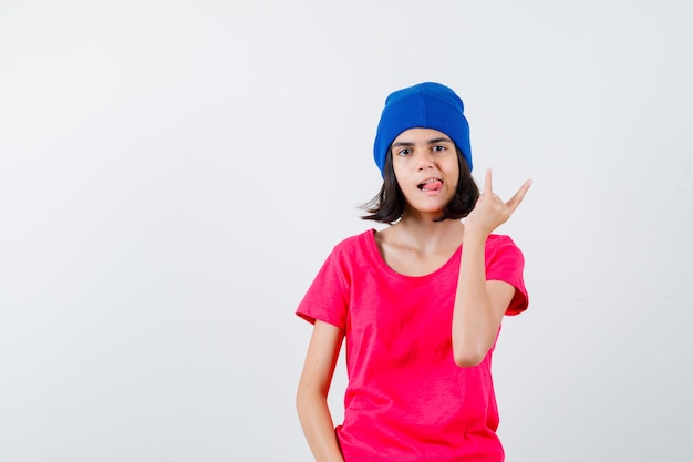 An expressive teenage girl is posing