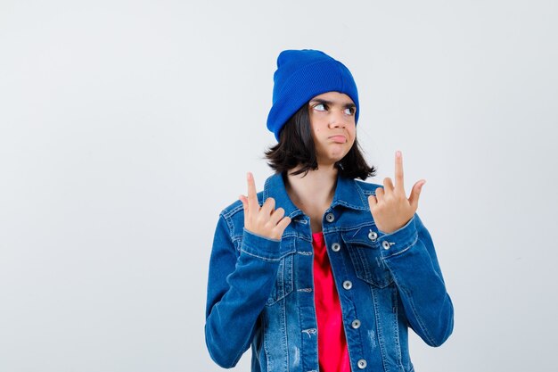 An expressive teenage girl is posing