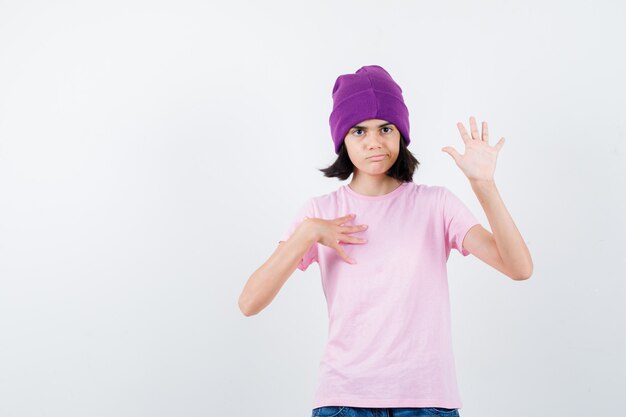 An expressive teenage girl is posing