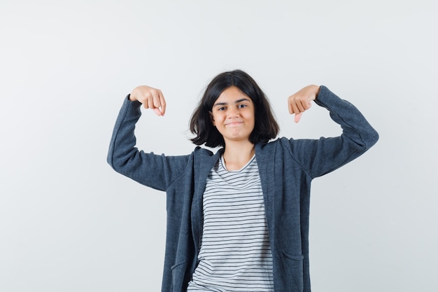 An expressive woman is posing in the studio