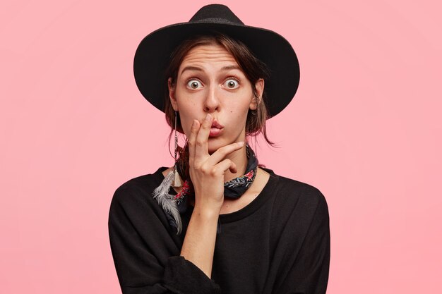 Expressive woman wearing all black clothes