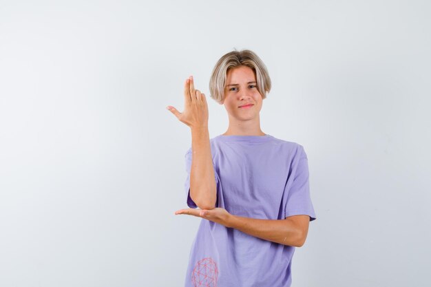 Expressive young boy posing in the studio