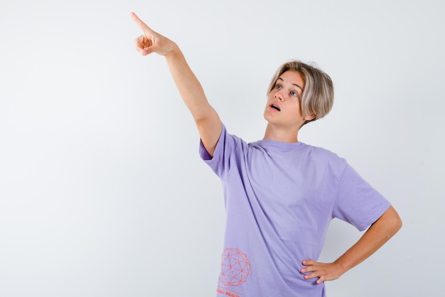 Expressive young boy posing in the studio