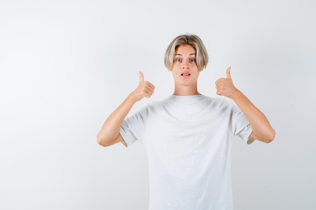 Expressive young boy posing in the studio