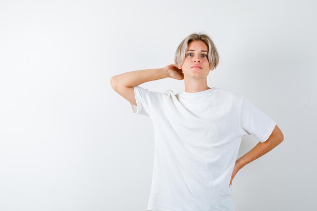 Expressive young boy posing in the studio