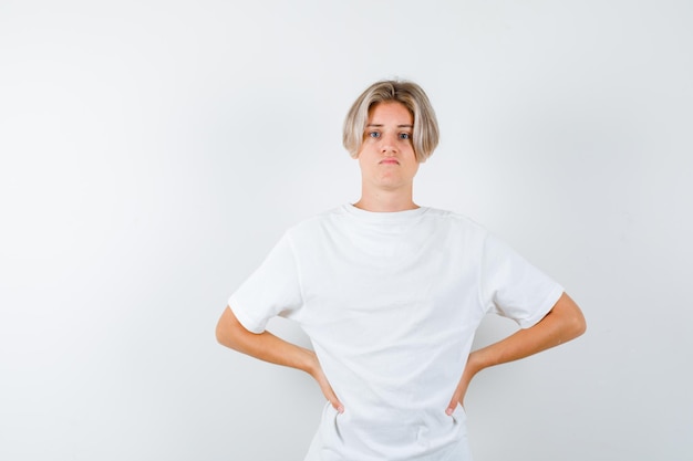 Expressive young boy posing in the studio