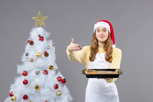 Expressive young cook posing for winter holidays