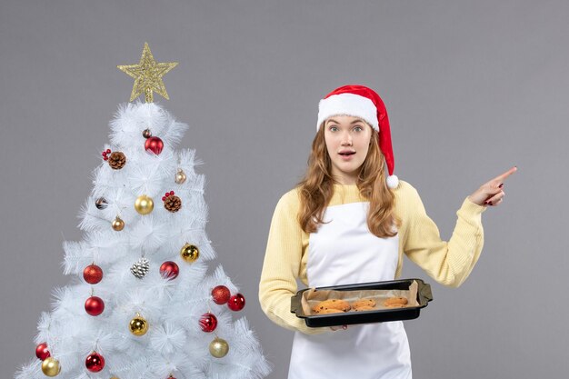 Expressive young cook posing for winter holidays