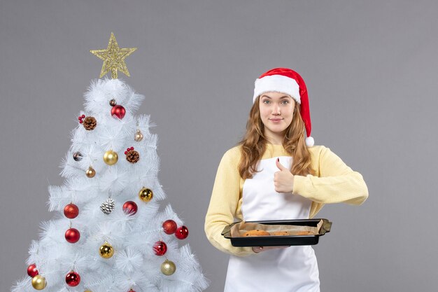 Expressive young cook posing for winter holidays