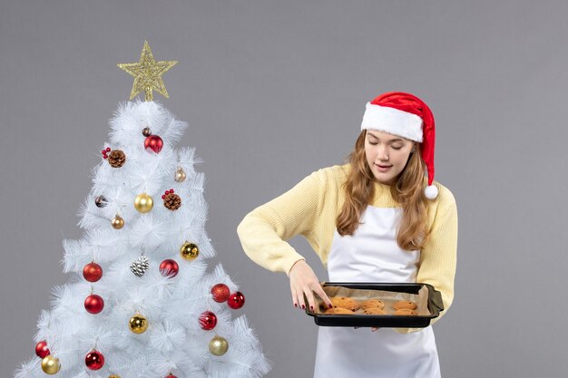 Expressive young cook posing for winter holidays