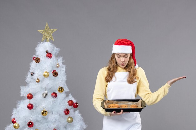 Expressive young cook posing for winter holidays