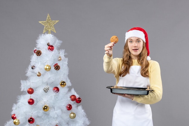 Expressive young cook posing for winter holidays