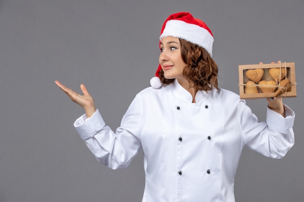 Free photo expressive young cook posing for winter holidays