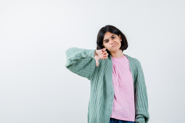 Expressive young girl posing in the studio