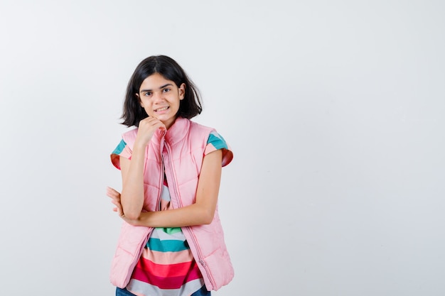 Expressive young girl posing in the studio