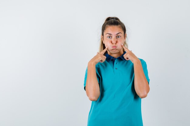 Expressive young girl posing in the studio