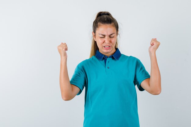 Expressive young girl posing in the studio