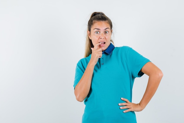 Expressive young girl posing in the studio