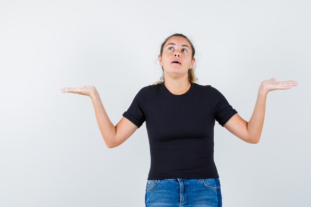 Expressive young girl posing in the studio