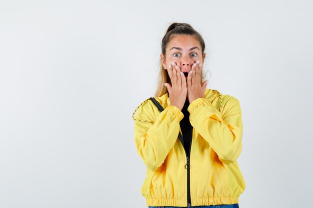 Expressive young girl posing in the studio