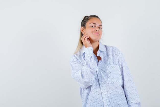 Expressive young girl posing in the studio