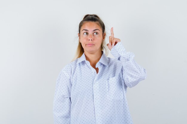 Expressive young girl posing in the studio