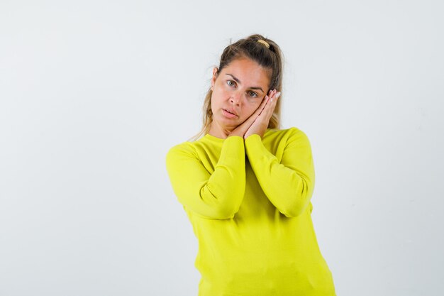 Expressive young girl posing in the studio