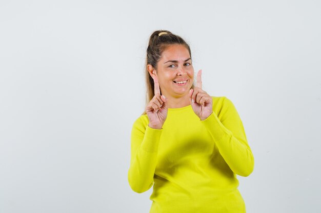 Expressive young girl posing in the studio