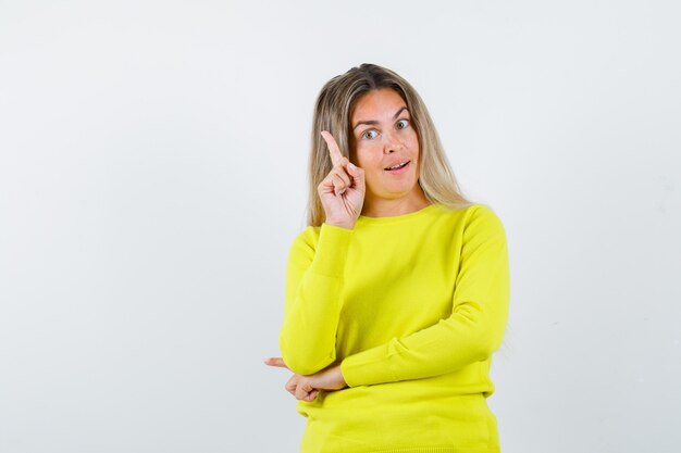 Expressive young girl posing in the studio