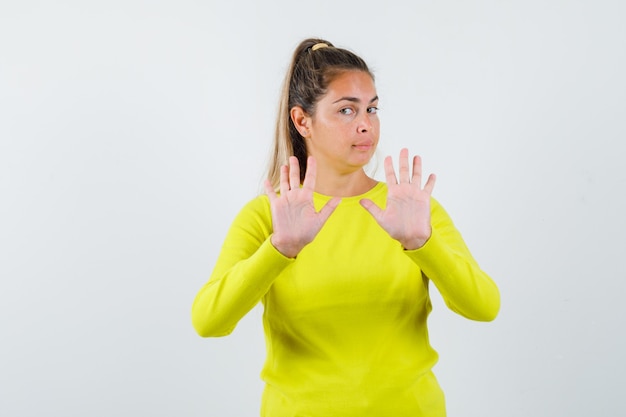 Expressive young girl posing in the studio