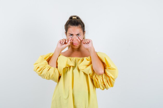 Expressive young girl posing in the studio